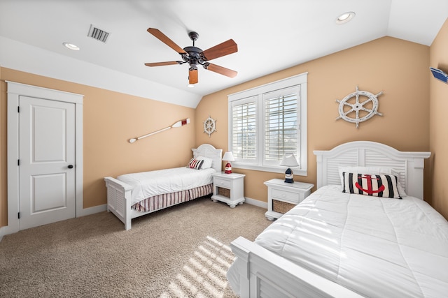 bedroom with carpet flooring, ceiling fan, and lofted ceiling