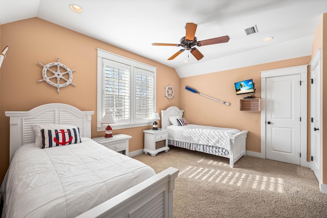 carpeted bedroom featuring vaulted ceiling and ceiling fan