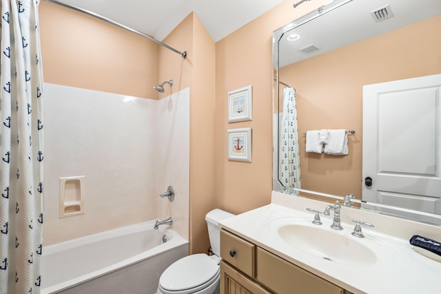 full bathroom with vanity, toilet, and shower / tub combo with curtain