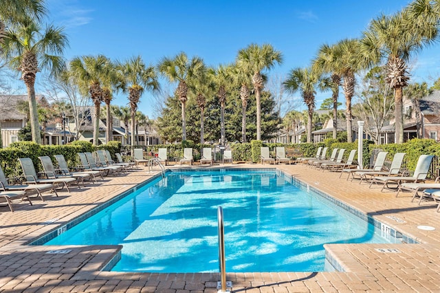 view of swimming pool featuring a patio area