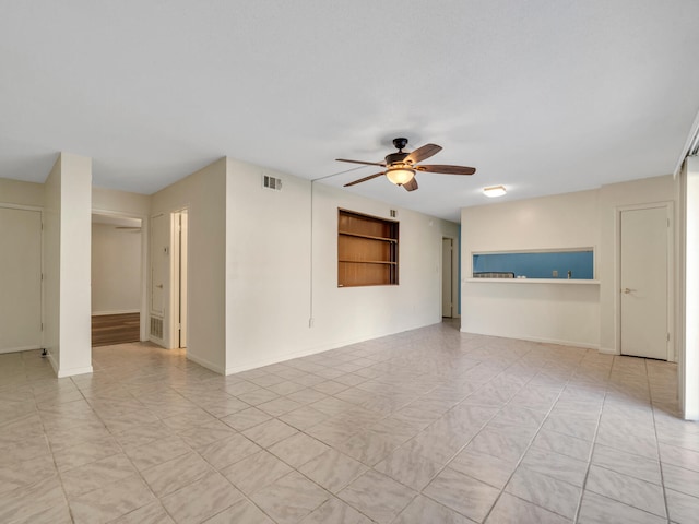 empty room with ceiling fan