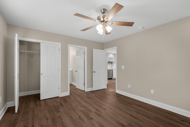 unfurnished bedroom with dark hardwood / wood-style flooring, a closet, and ceiling fan