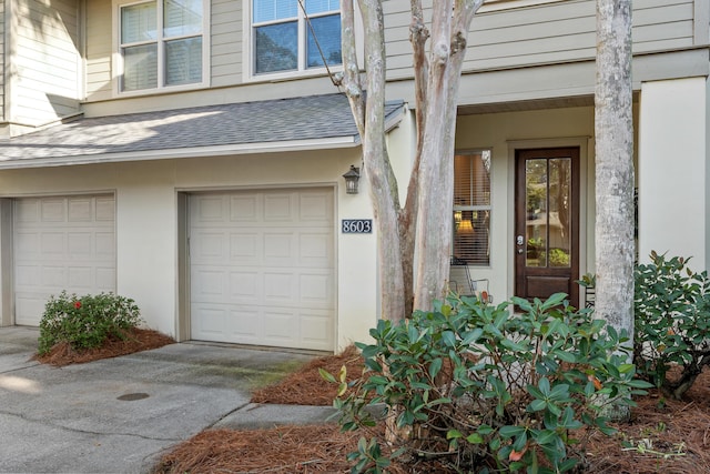 entrance to property with a garage