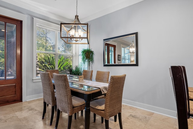 dining room featuring a chandelier