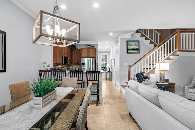 dining area featuring a chandelier