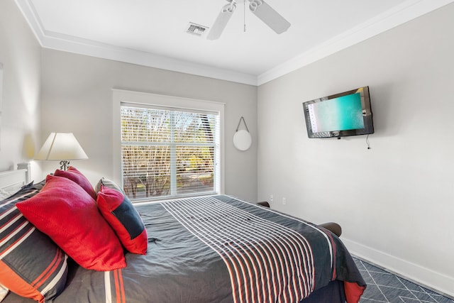 bedroom with carpet flooring, ceiling fan, and ornamental molding