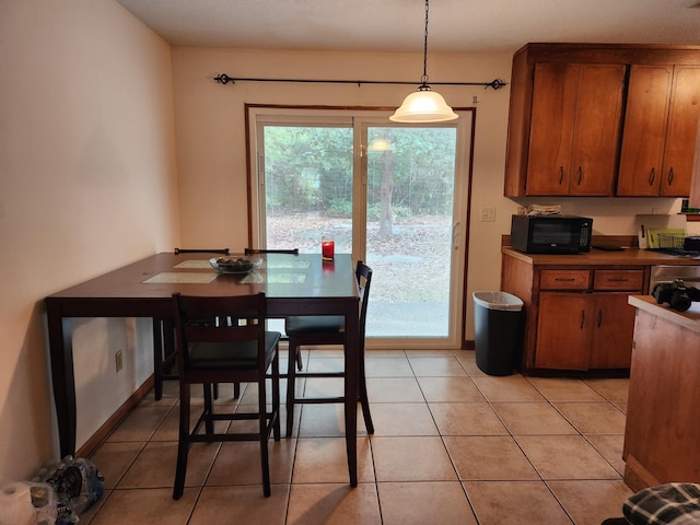 dining room featuring light tile patterned floors