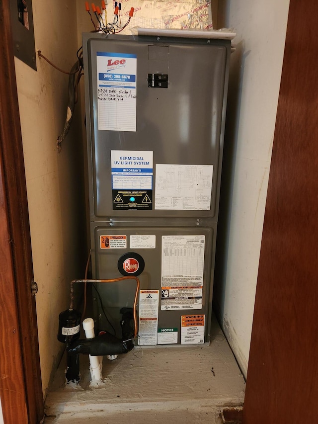 utility room with heating unit