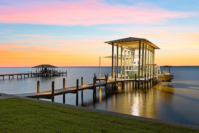 dock area featuring a water view