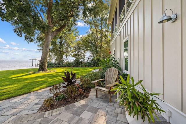 view of patio / terrace with a water view