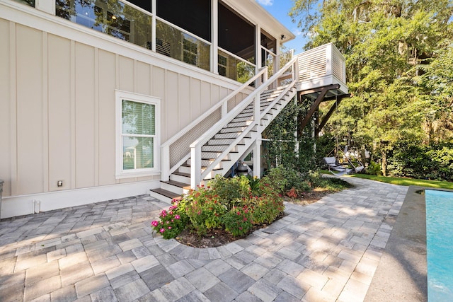 view of property exterior featuring a patio area