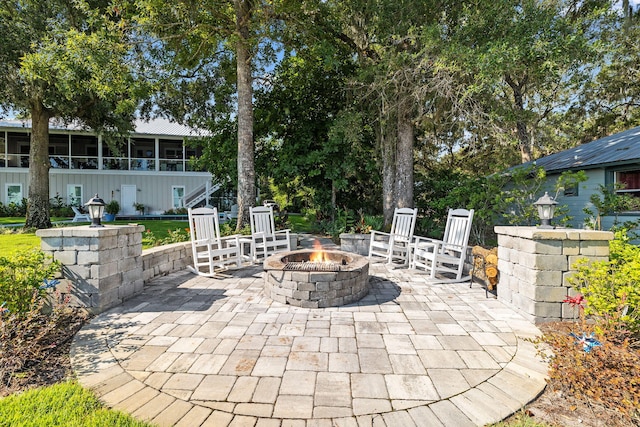 view of patio featuring a fire pit