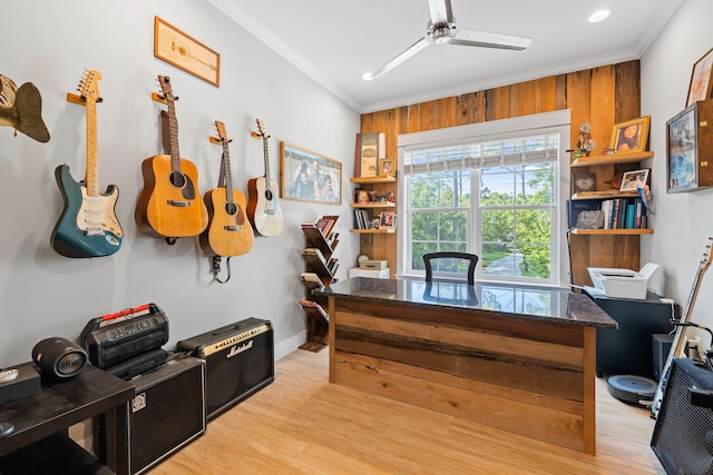 office with ceiling fan, ornamental molding, and light hardwood / wood-style flooring