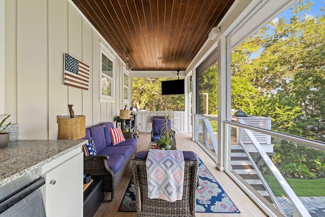 sunroom / solarium with wooden ceiling