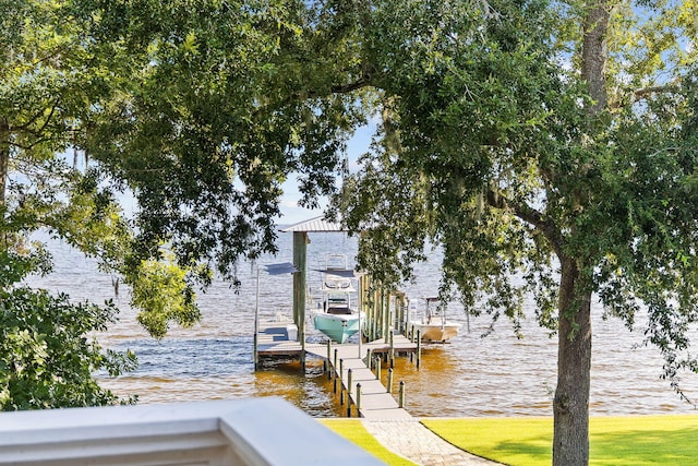 dock area featuring a water view