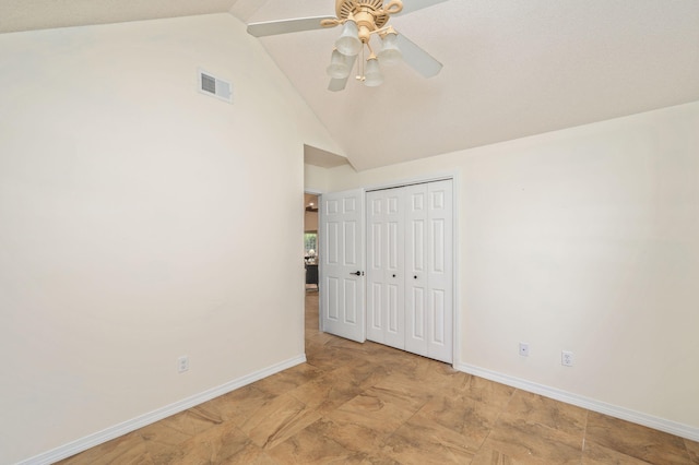 1905 W Mistral Ln, Fort Walton Beach, FL 32547 - unfurnished bedroom featuring vaulted ceiling, a closet, and ceiling fan