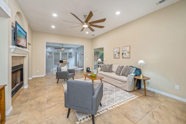 1905 W Mistral Ln, Fort Walton Beach, FL 32547 - living room featuring ceiling fan, a tile fireplace, and recessed lighting