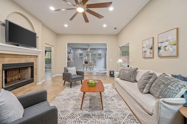 1905 W Mistral Ln, Fort Walton Beach, FL 32547 - living area with a ceiling fan, recessed lighting, a tiled fireplace, and light tile patterned floors