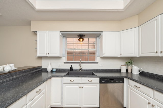 1905 W Mistral Ln, Fort Walton Beach, FL 32547 - kitchen with dishwasher, white cabinets, and tasteful backsplash