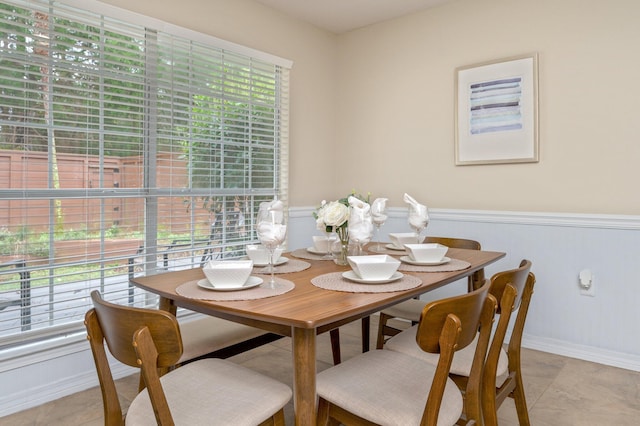 1905 W Mistral Ln, Fort Walton Beach, FL 32547 - dining space featuring a wainscoted wall and light tile patterned floors