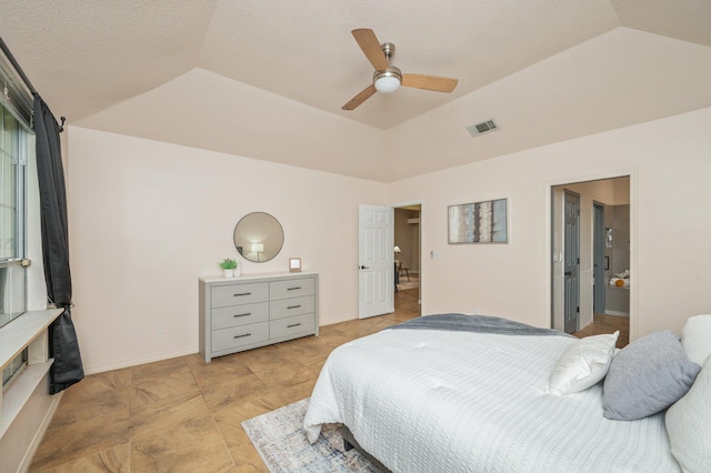 1905 W Mistral Ln, Fort Walton Beach, FL 32547 - bedroom with lofted ceiling, a textured ceiling, and a ceiling fan