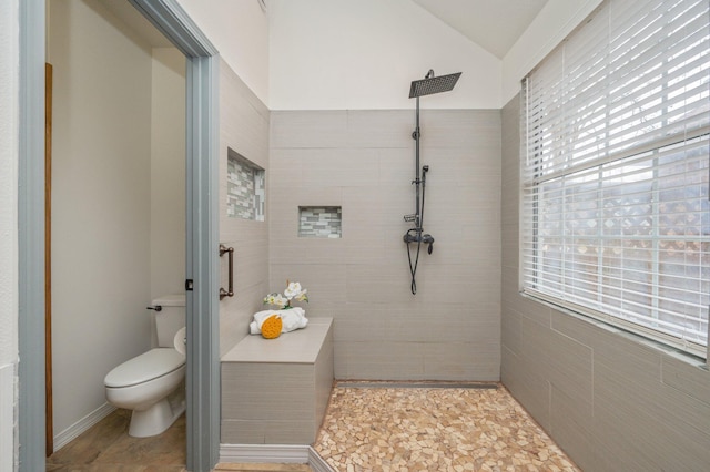 1905 W Mistral Ln, Fort Walton Beach, FL 32547 - bathroom with tiled shower and vaulted ceiling