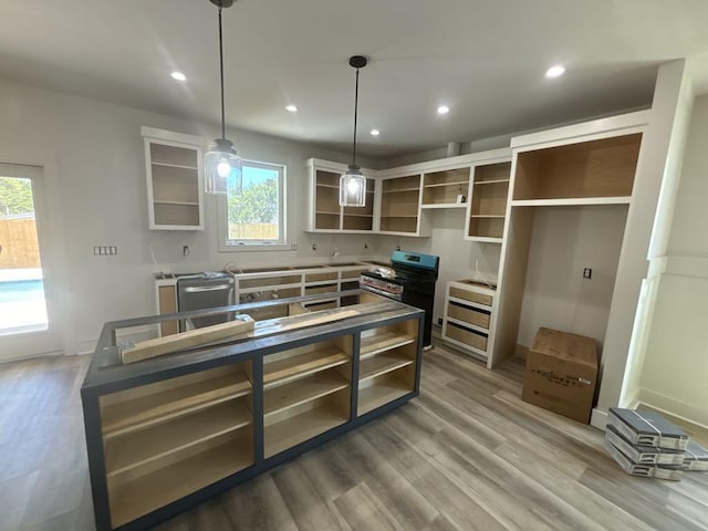 kitchen featuring recessed lighting, open shelves, white cabinets, and light wood-type flooring