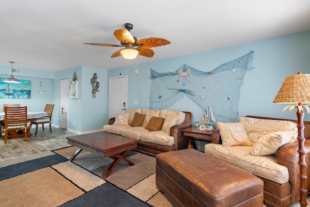 living room featuring ceiling fan