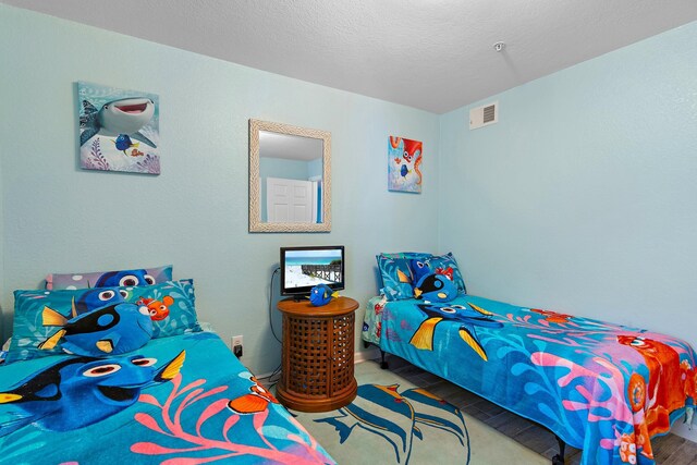 bedroom with a textured ceiling