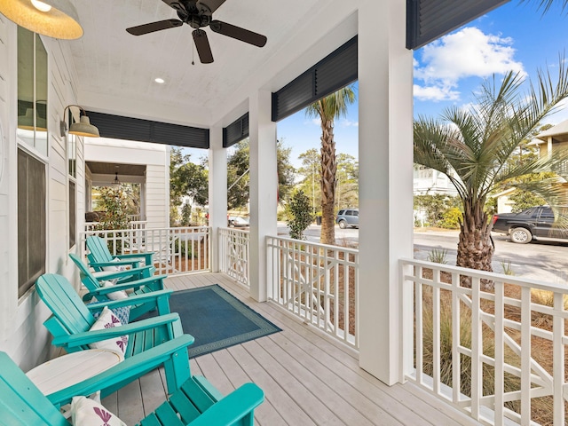 deck featuring ceiling fan and covered porch