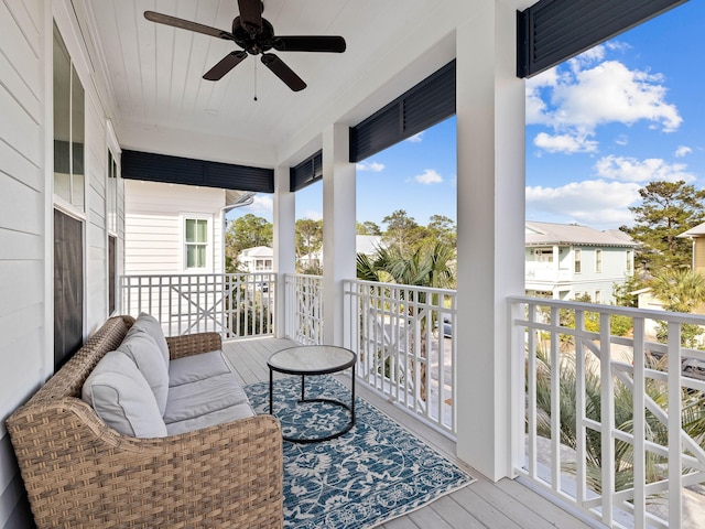 balcony featuring ceiling fan