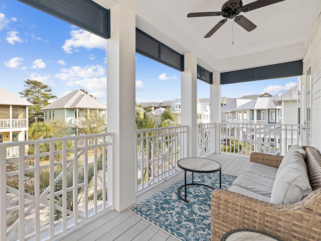 wooden terrace with ceiling fan