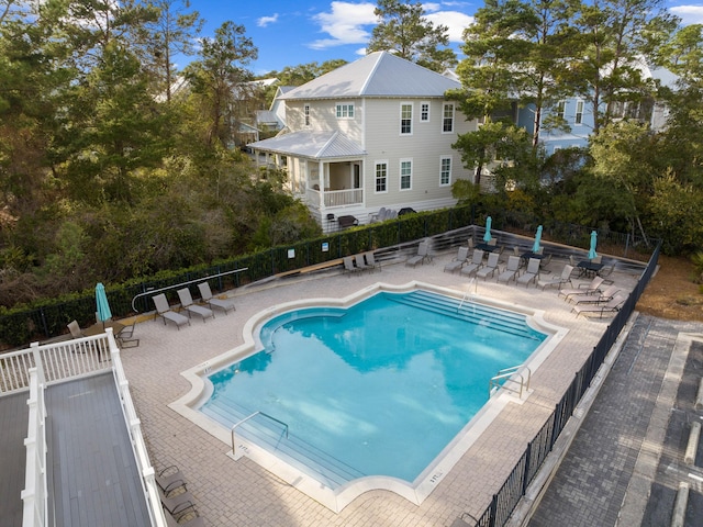 view of swimming pool featuring a patio