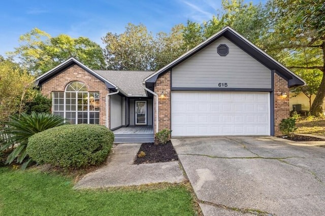 single story home with a garage