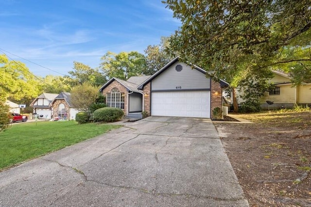 view of front of house featuring a garage and a front yard