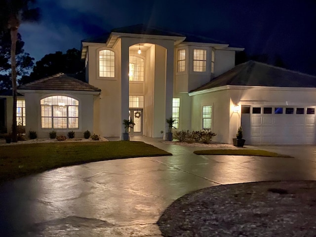 view of front of home with a garage