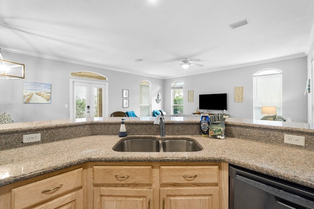 kitchen with sink, french doors, light brown cabinets, stainless steel dishwasher, and crown molding