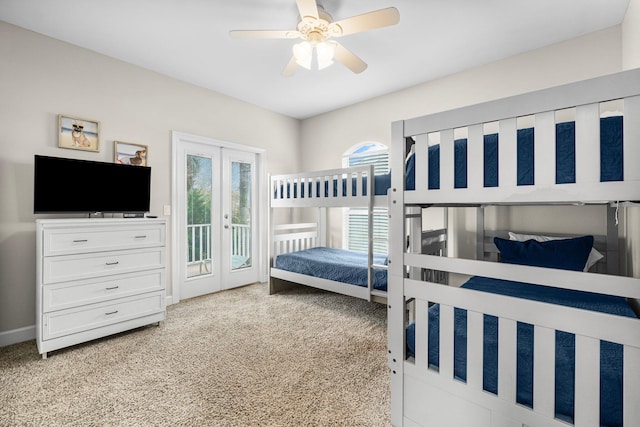 bedroom featuring access to outside, light colored carpet, and ceiling fan