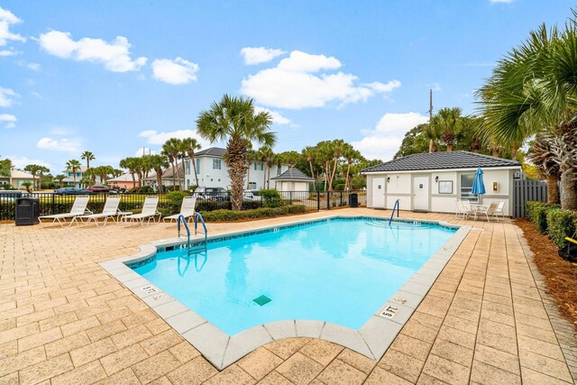 view of pool featuring a patio