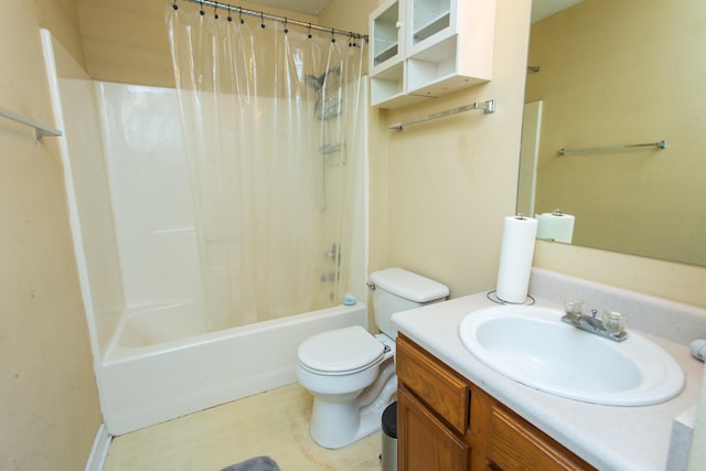 full bathroom featuring vanity, toilet, and shower / tub combo with curtain