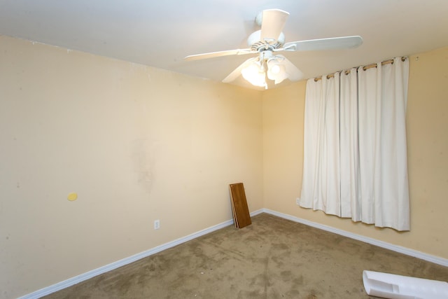 unfurnished room with carpet floors and ceiling fan