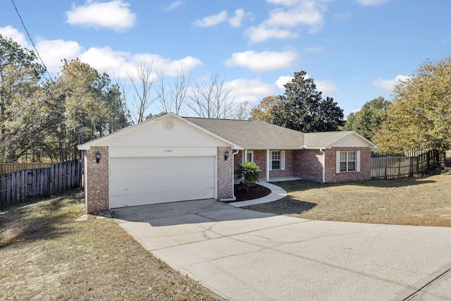 ranch-style home with a garage and a front lawn