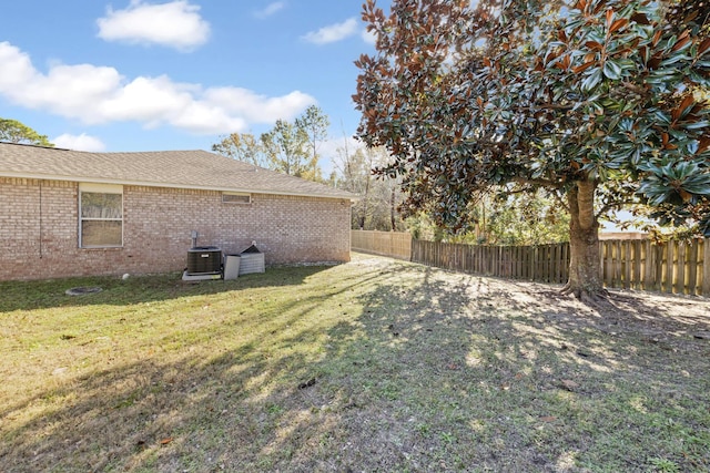 view of yard with central AC