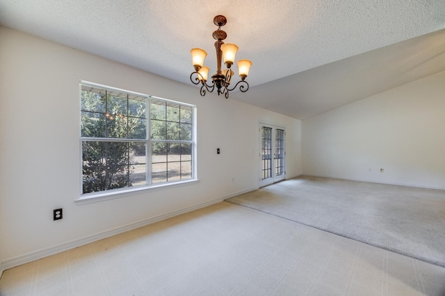 8180 Shooter Ln, Laurel Hill, FL 32567 - carpeted spare room featuring a chandelier and a textured ceiling
