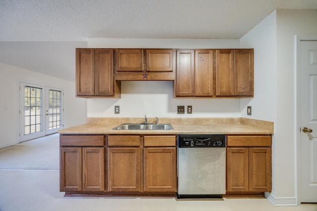 8180 Shooter Ln, Laurel Hill, FL 32567 - kitchen with dishwasher, a sink, brown cabinetry, and a textured ceiling