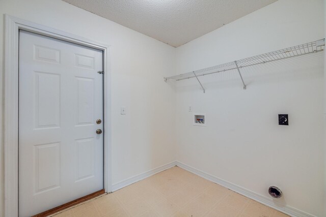 8180 Shooter Ln, Laurel Hill, FL 32567 - washroom with electric dryer hookup, hookup for a washing machine, baseboards, and light flooring