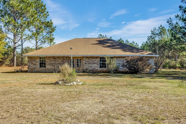 8180 Shooter Ln, Laurel Hill, FL 32567 - back of property with a lawn