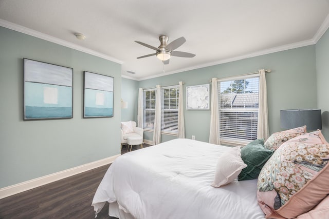 bedroom with crown molding, ceiling fan, and dark wood-type flooring