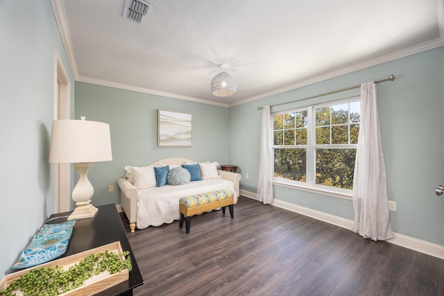 bedroom with dark hardwood / wood-style floors and crown molding