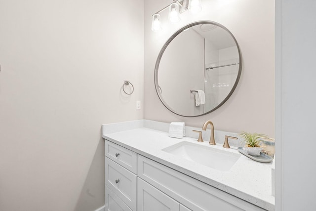 bathroom featuring vanity and walk in shower